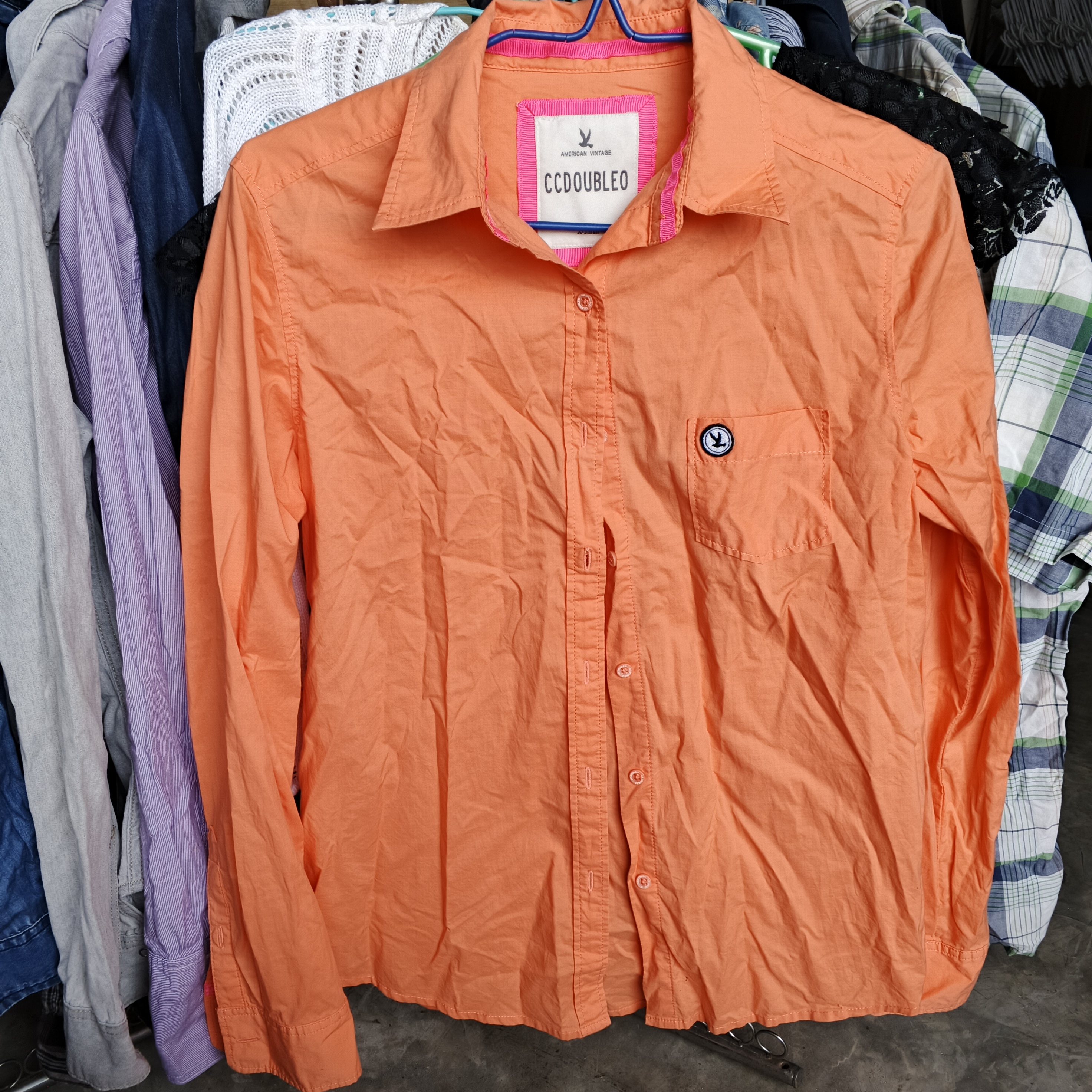 เสื้อเชิ้ตงานป้าย